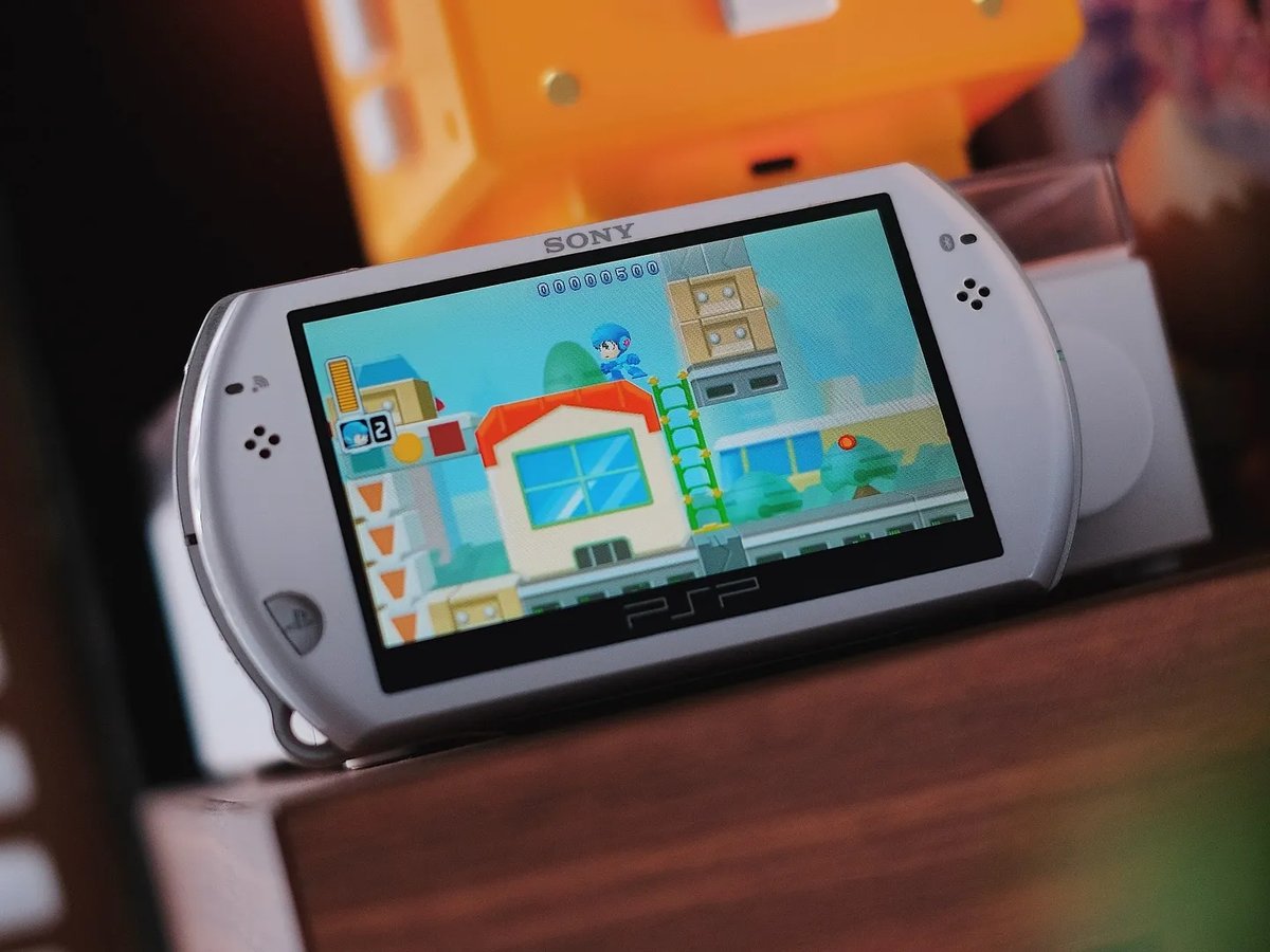 Sony PSP Go vs. Nintendo Switch OLED Specs Comparison - Retro Catalog