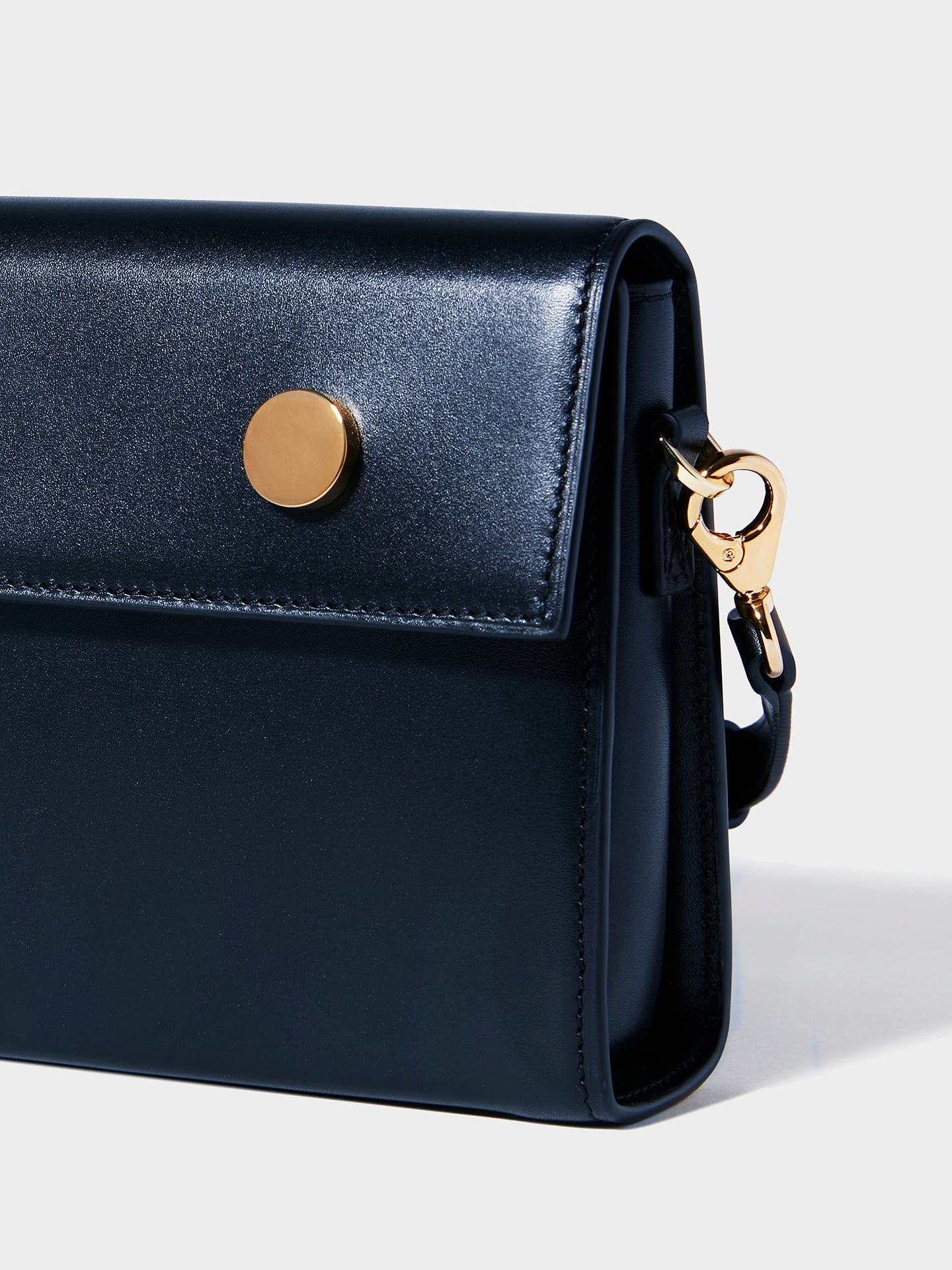 Golden eyesのスムースネイビーカーフスキン – RSVP Paris