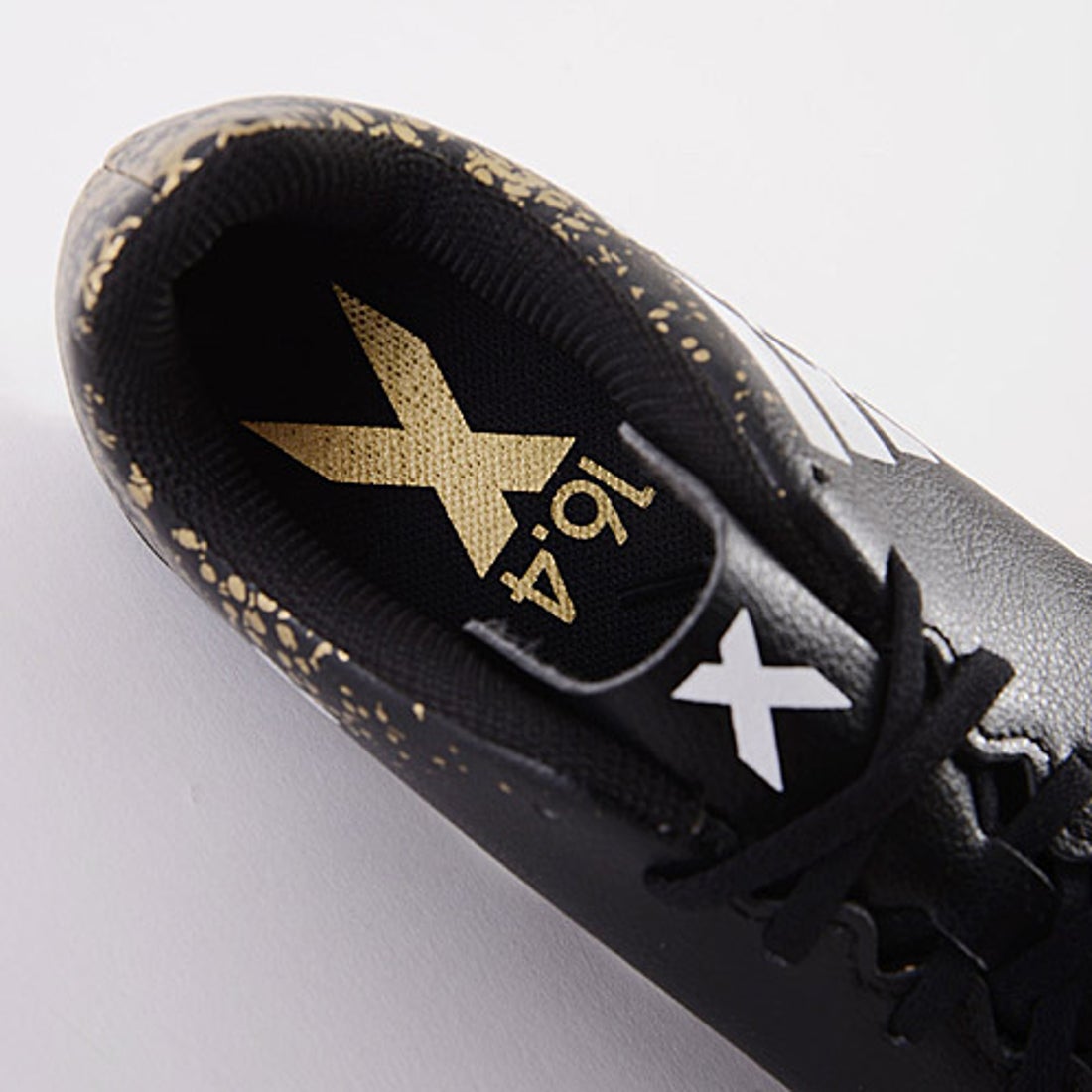 adidas アディダス エックス 16.4 AI1 ジュニア(ブラック×ゴールド
