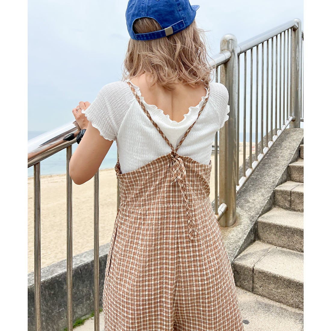 ジュノア JUNOAH バックリボンチェックロンパース （オレンジ