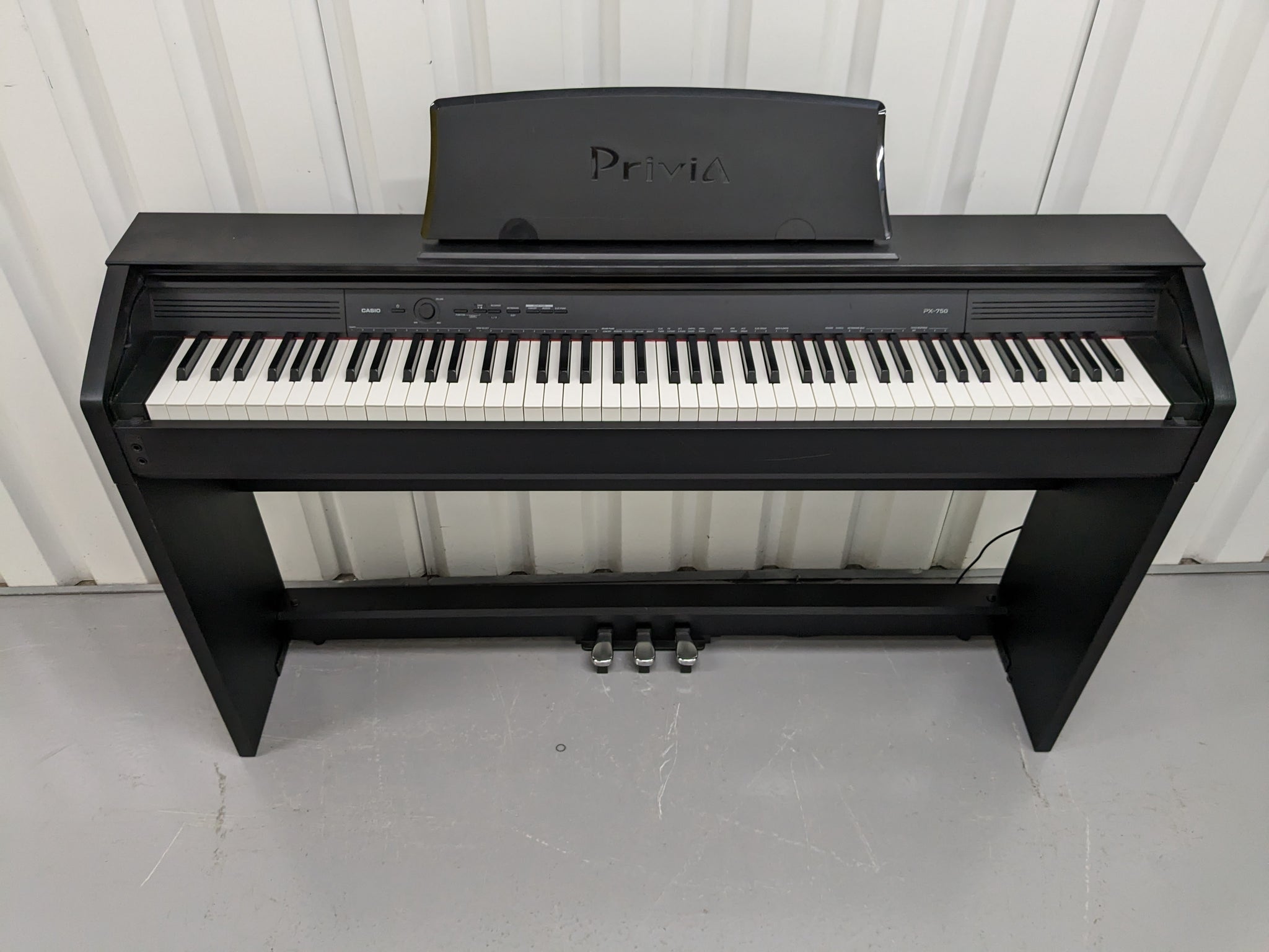 Casio Privia PX-750 Slim Digital Piano in satin black space saving