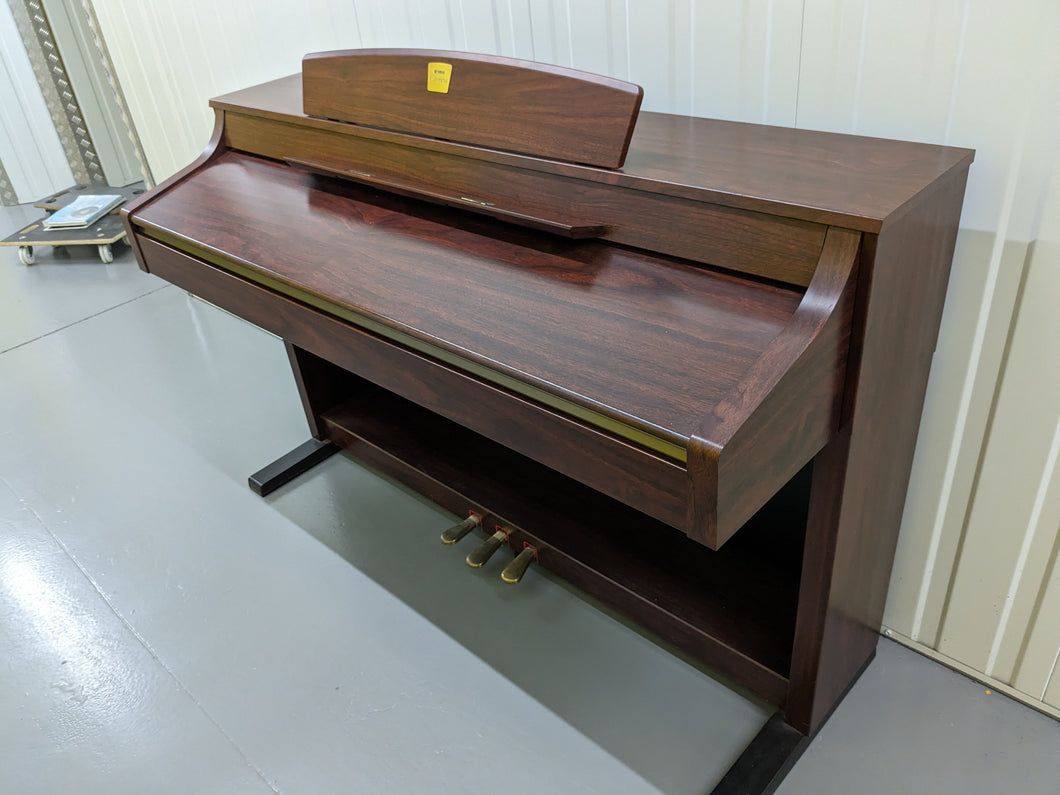 Yamaha Clavinova CLP-340 Digital Piano in mahogany finish stock