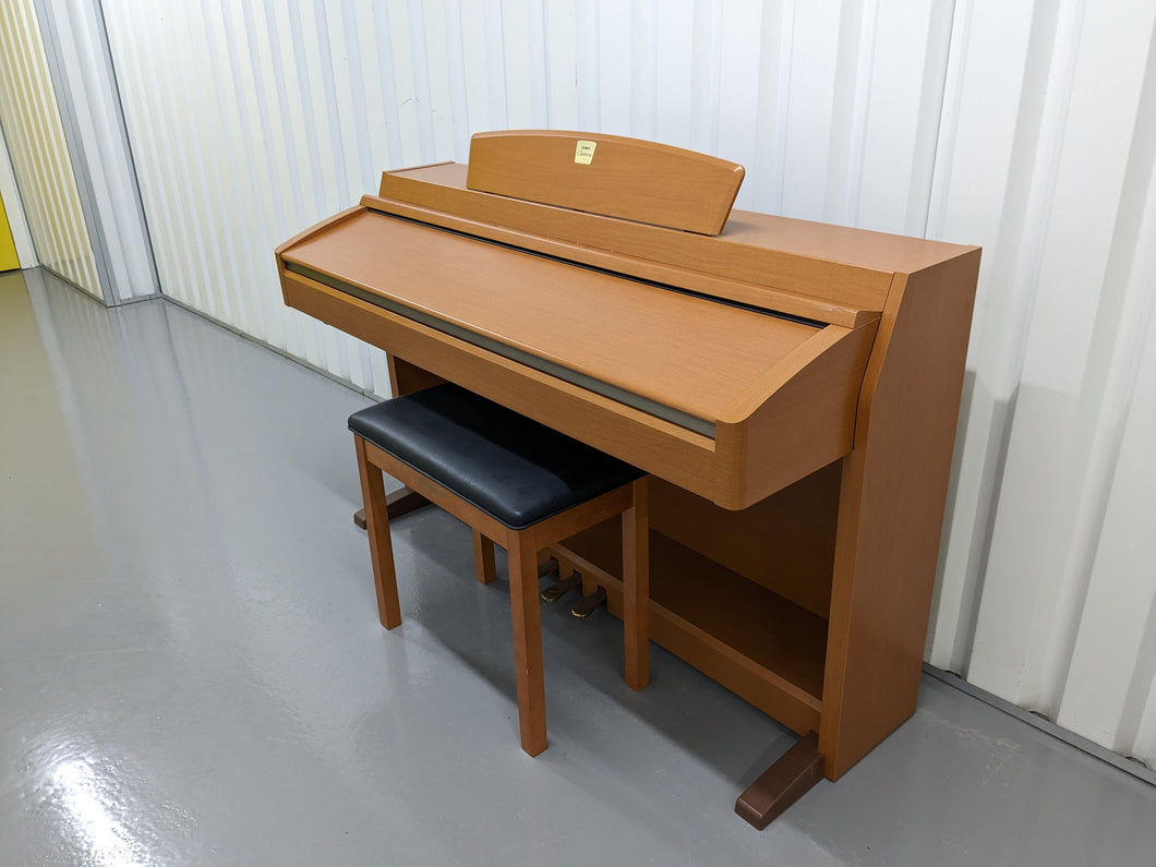 Yamaha Clavinova CLP-240 digital piano and stool in cherry wood
