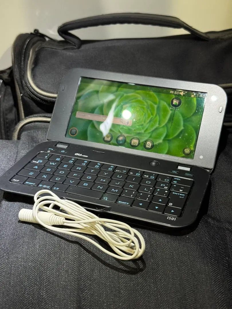 2026年最新】au is01の人気アイテム - メルカリ