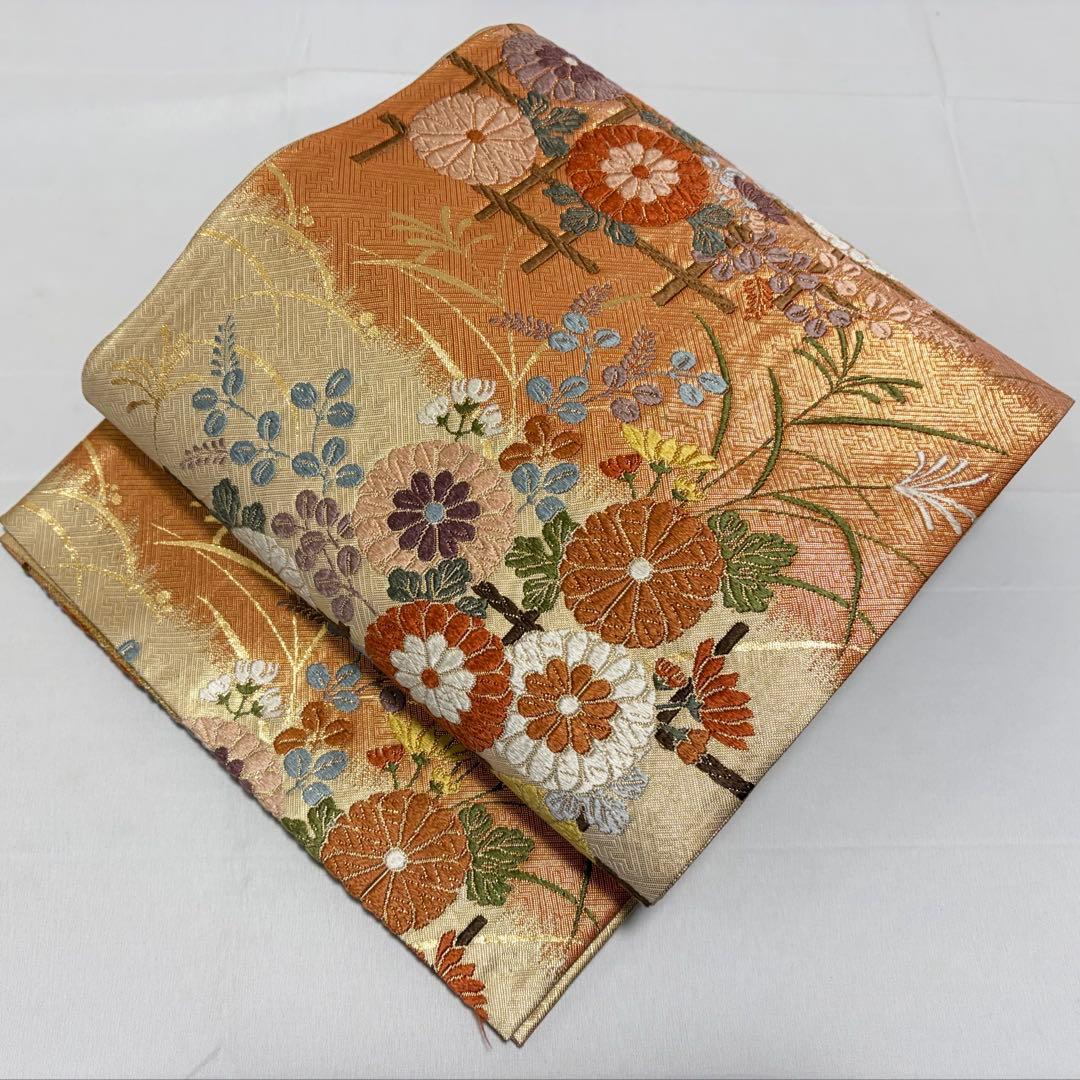 A 唐織 花々模様 金糸 オレンジ 正絹 六通 袋帯 フォーマル O50 - メルカリ