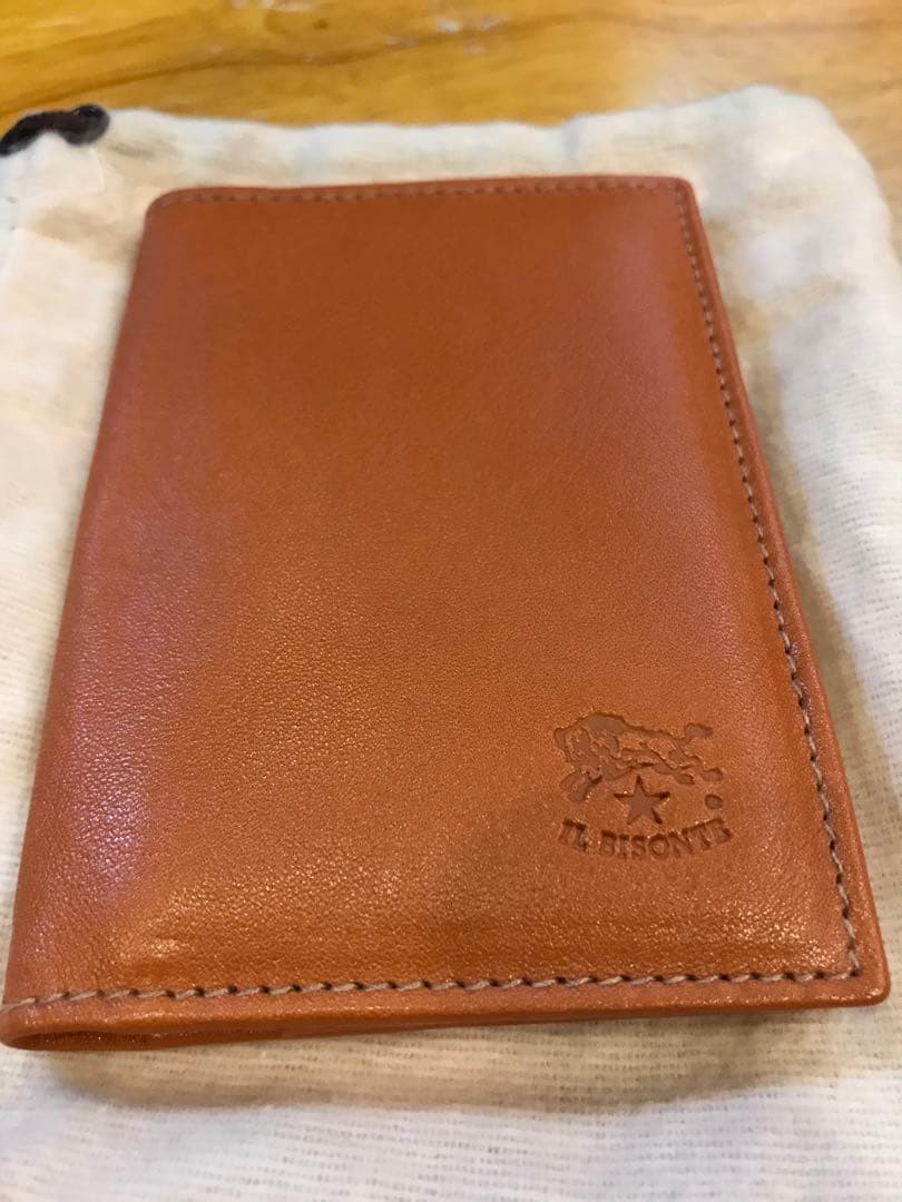 瞬間タイムセール大人気イルビゾンテオレンジ 二つ折り名刺入れ　未使用品 IL BISONTE（イルビゾンテ） レザーパスケース カードケース 二つ折り