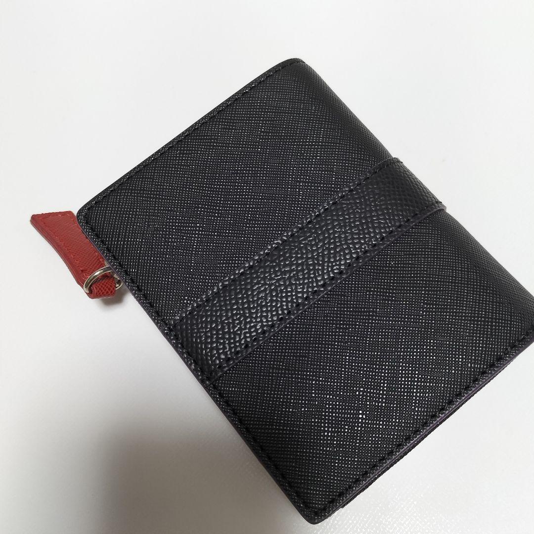 魔法少女まどか☆マギカ 二つ折り財布 悪魔ほむら モデル 中古 - メルカリ