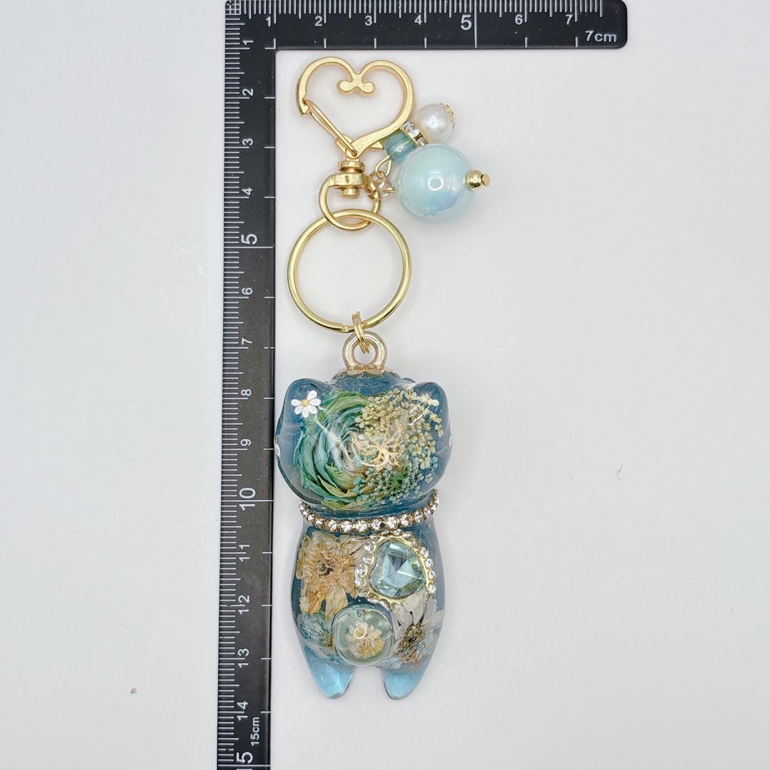 猫ちゃん^ ̳ᴗ ̫ ᴗ ̳^アクアマリン オルゴナイト キーホルダー - メルカリ