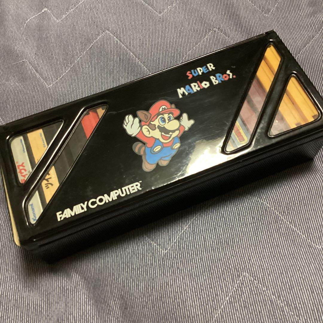ファミコンマリオ柄収納ケース＆カセット16本 - メルカリ