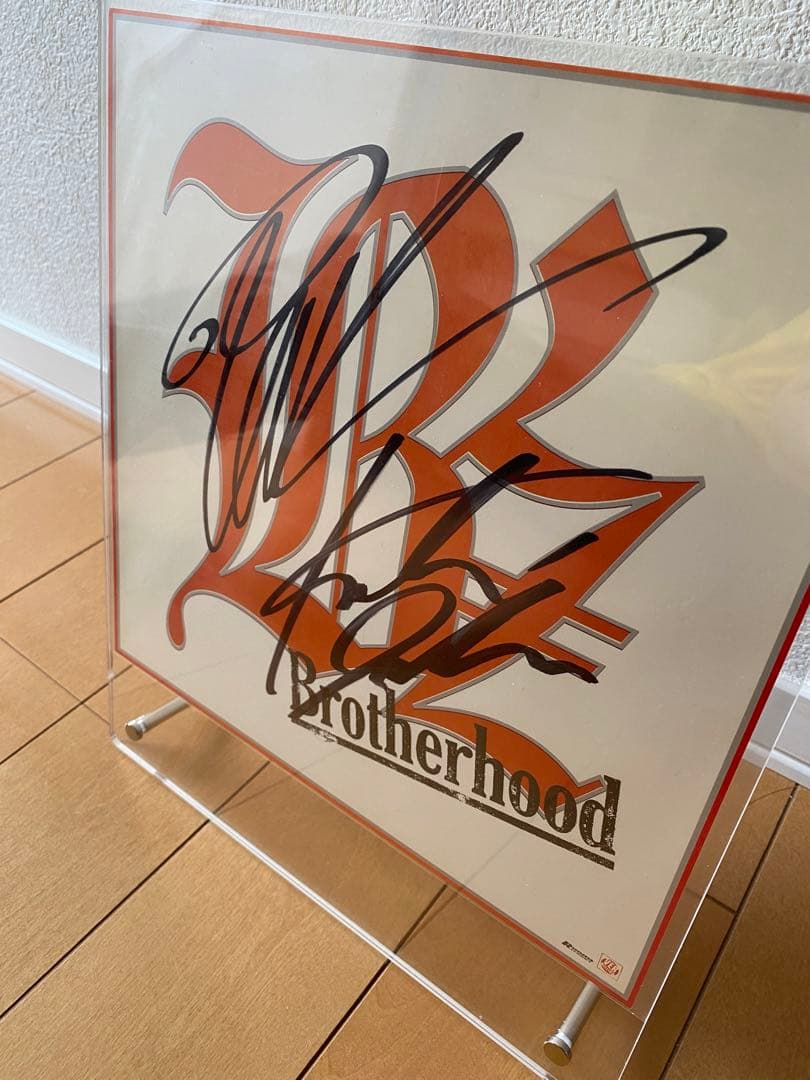 B'z LIVE-GYM99 brotherhood 直筆サイン色紙貴重 - メルカリ