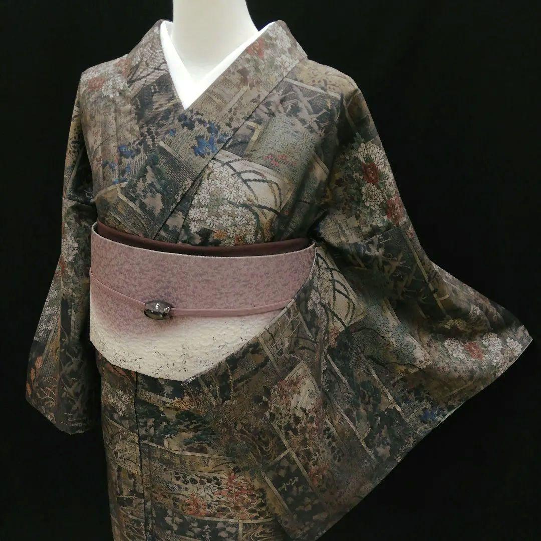 本場大島紬(袷) (四季の草花紋様 恵 積五郎(絣の魔術師) 裄68㌢身幅