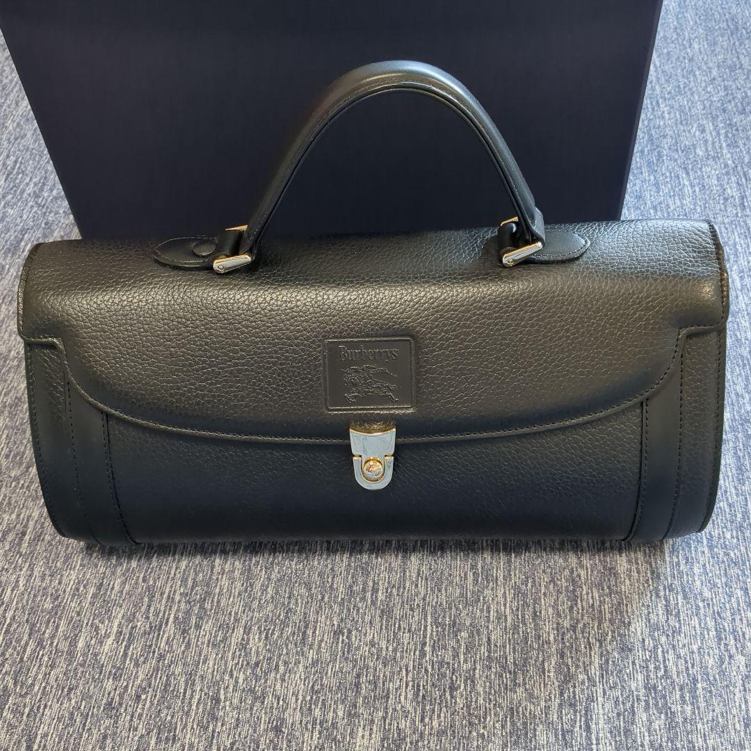 Burberry ブラックレザー ハンドバッグ - メルカリ