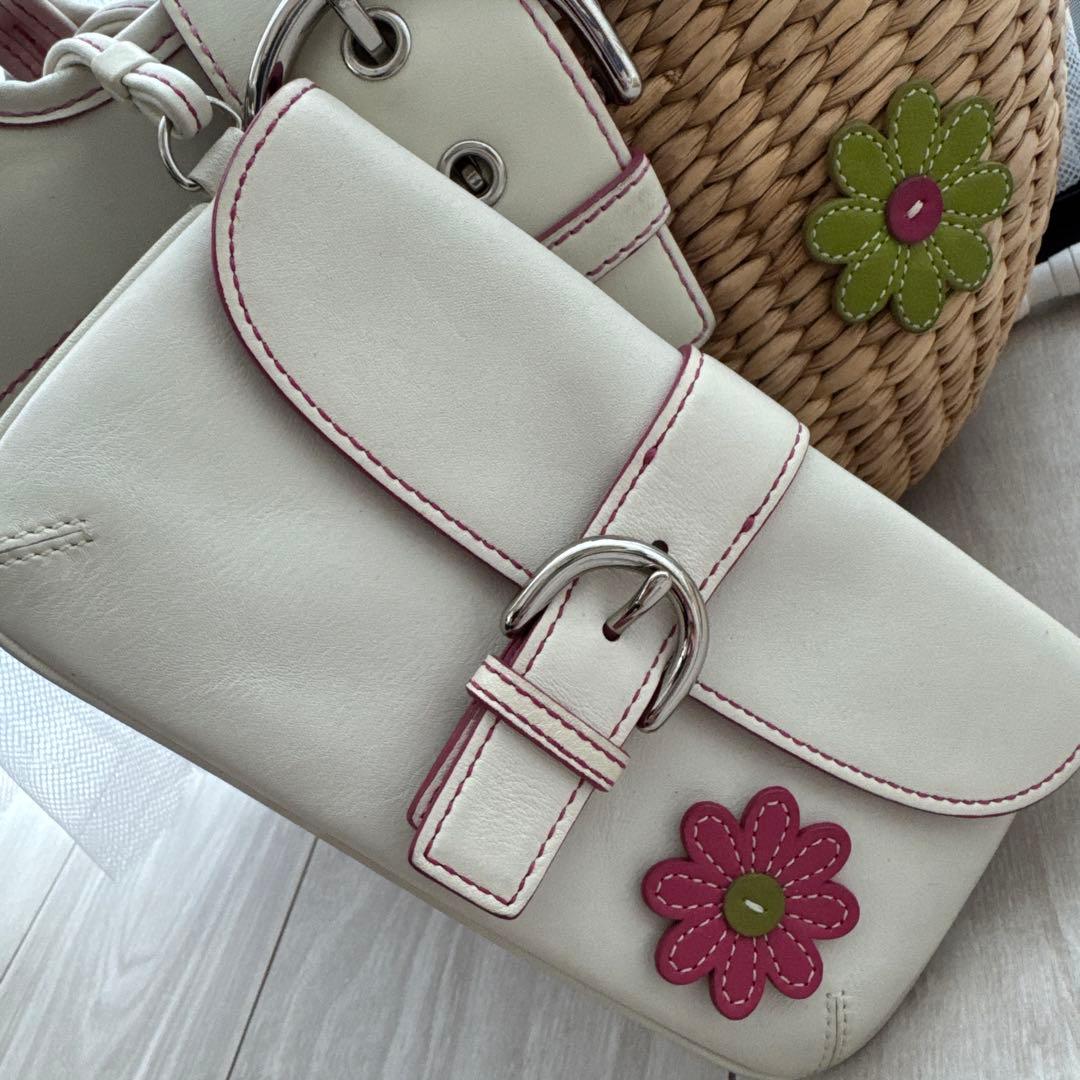 yuki 様専用 COACH 花モチーフ付きベージュかごバッグ - メルカリ