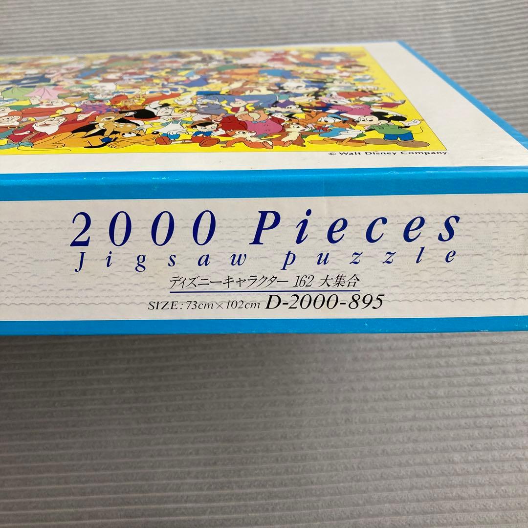ディズニーキャラクター162大集合！2000ピースパズル - メルカリ