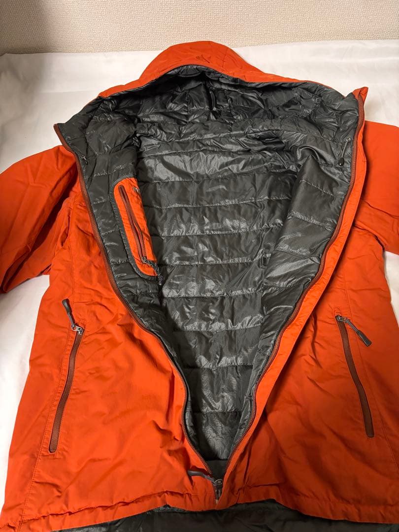 人気モンベル725FP コロラドパーカ メンズLリバーシブルダウンオレンジ