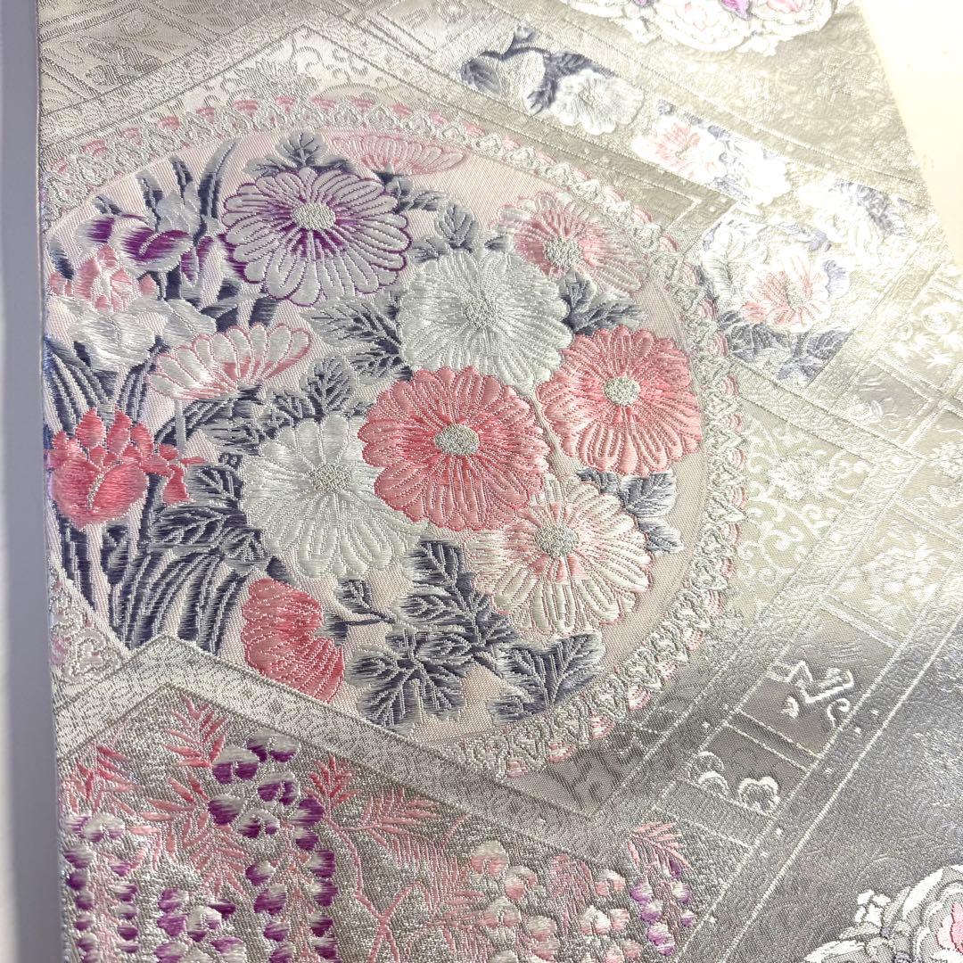 5k2780 袋帯 絹 唐織 プラチナ箔 正倉院文様 華文 銀色 白 ピンク 紫