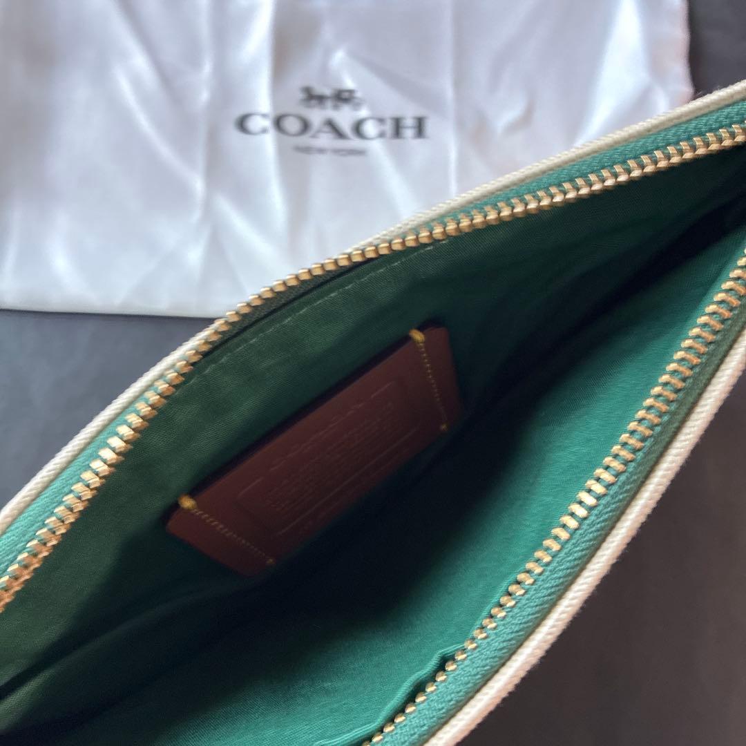新品未使用品】COACH クラッチバッグ キャンバス生地 - メルカリ