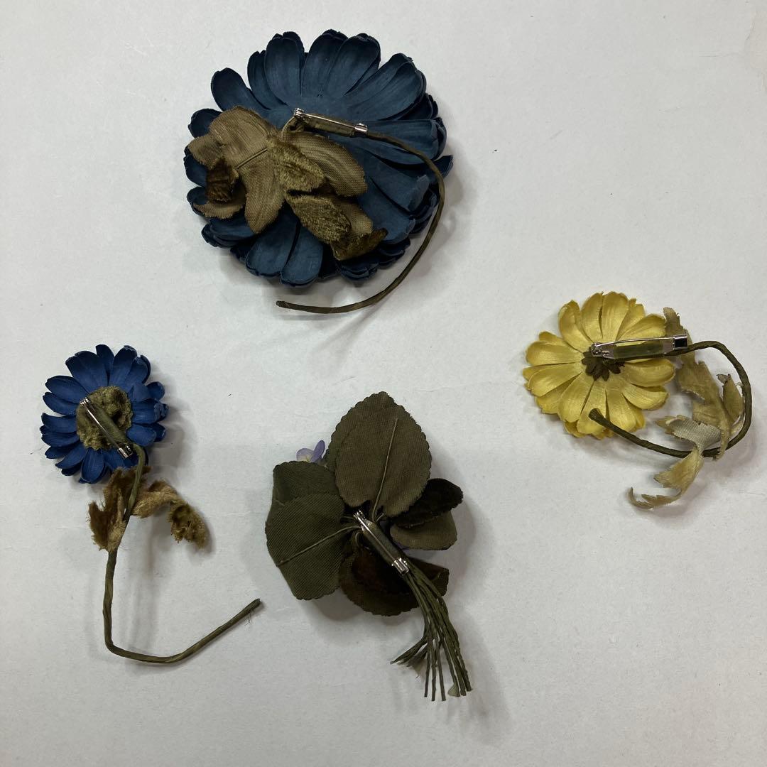 ワンダフルワールド コサージュ4個set - メルカリ