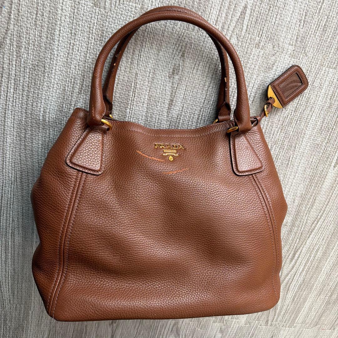 PRADA ブラウンレザートートバッグ - メルカリ