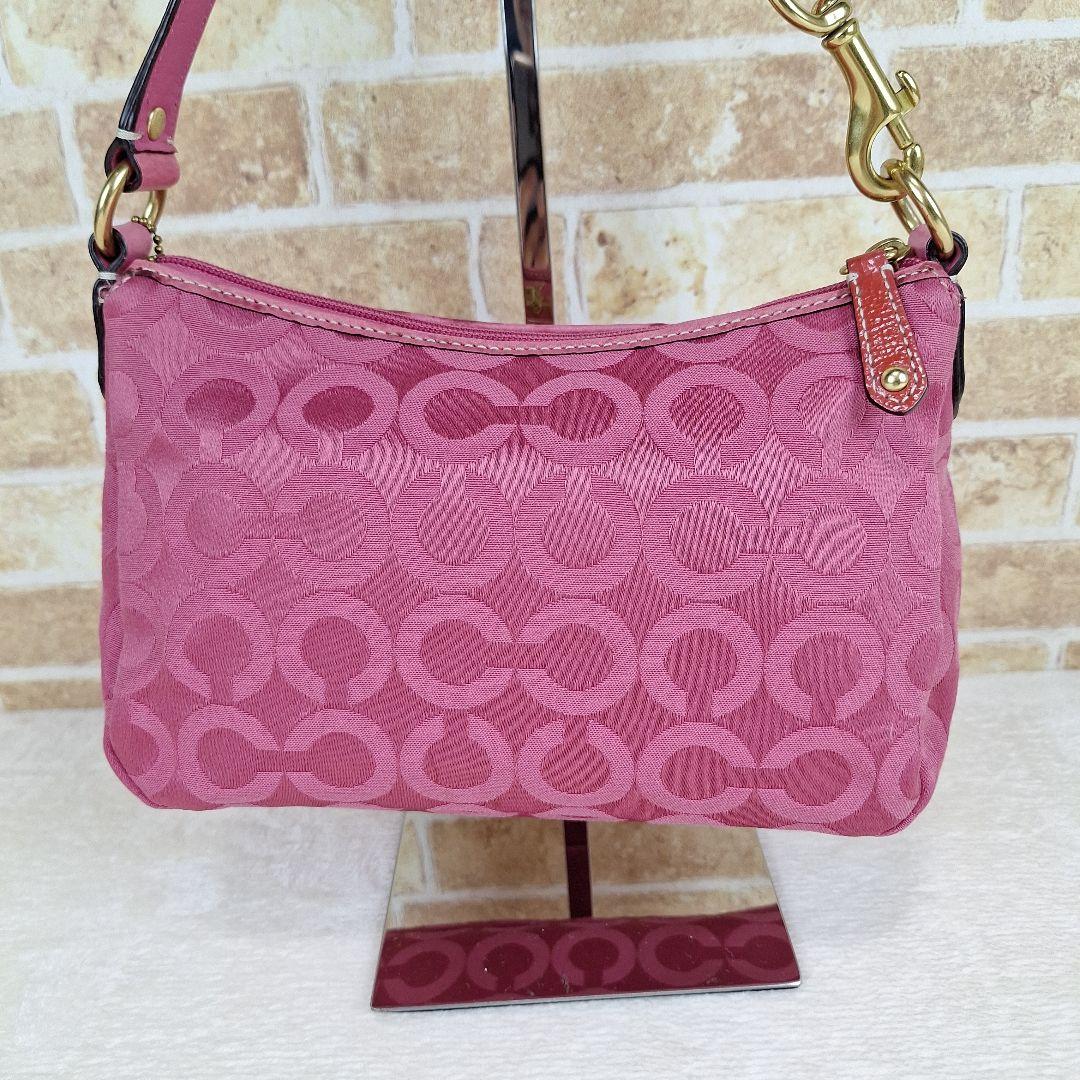 COACH コーチ アクセサリーポーチ キャンバスレザー 馬車 ピンク