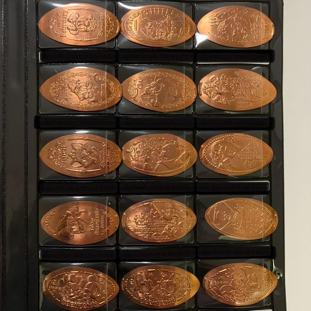 ディズニー スーベニアメダル コレクションブック 4冊 コイン メダル