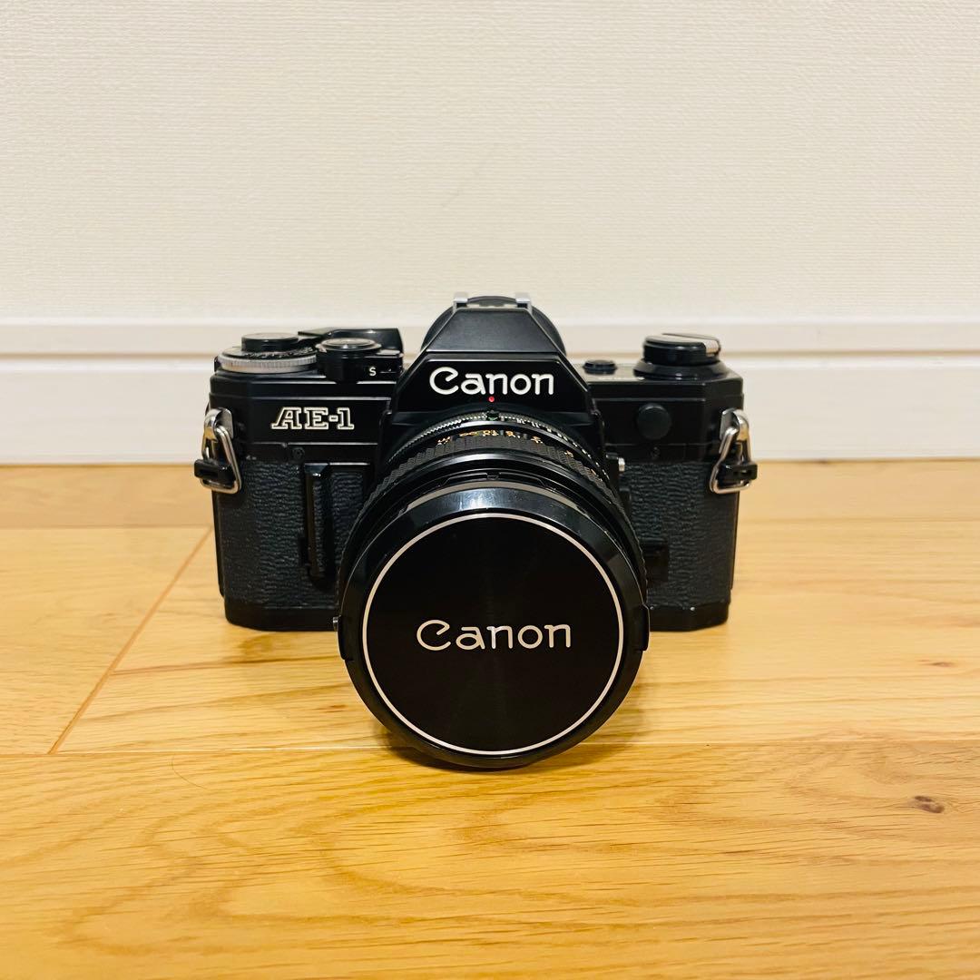 Canon AE1 フィルムカメラ ストロボ付き - メルカリ