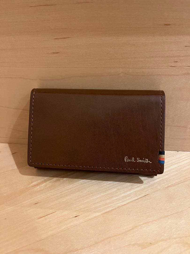 Paul Smith ブラウン名刺入れ 楽天市場】Paul Smith ポールスミス二つ折り名刺入れ 箔押しロゴコード