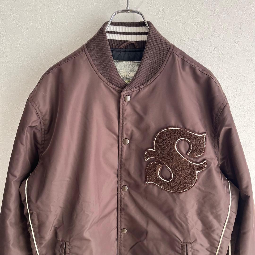 希少】STUSSY スタジャン OLD GOLD Sロゴ オールドステューシー - メルカリ