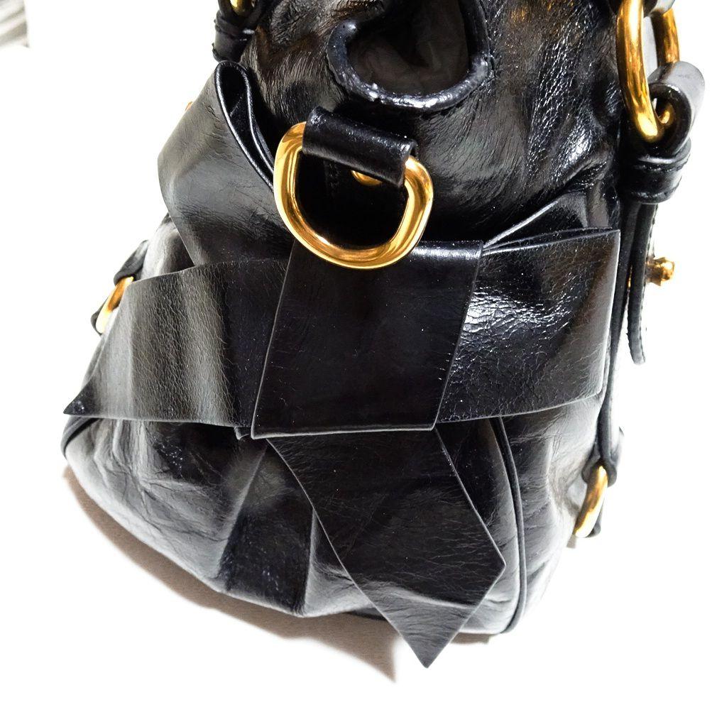 miumiu サイドリボン 2wayバッグ ブラック ヴィッテロルクス - メルカリ