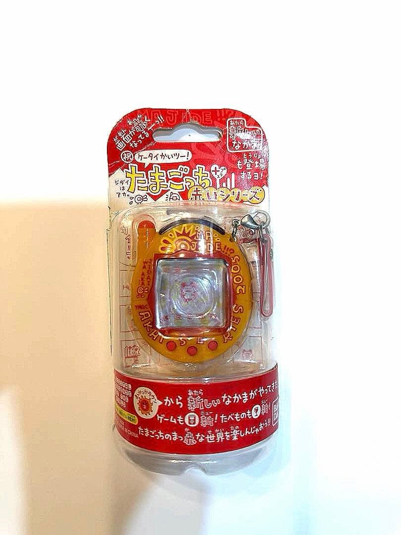 【新品未開封】祝ケータイかいツー！　たまごっち＋　赤いシリーズ　マジデおれんじ バンダイ 商品・サービスサイト | 祝ケータイかいツー！たまごっち