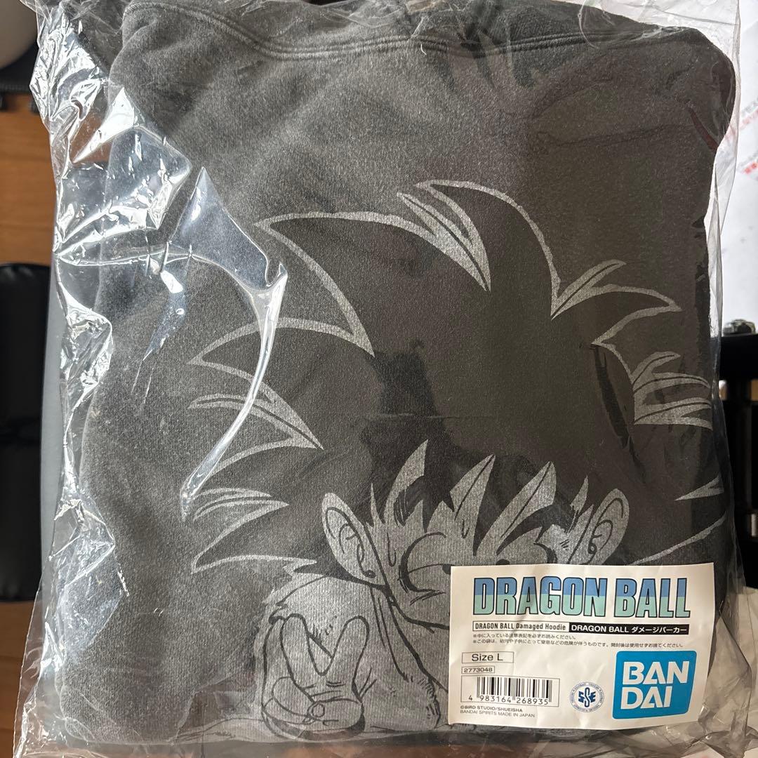 新品未使用】 ドラゴンボール 40周年 ダメージパーカー ダイマツリ