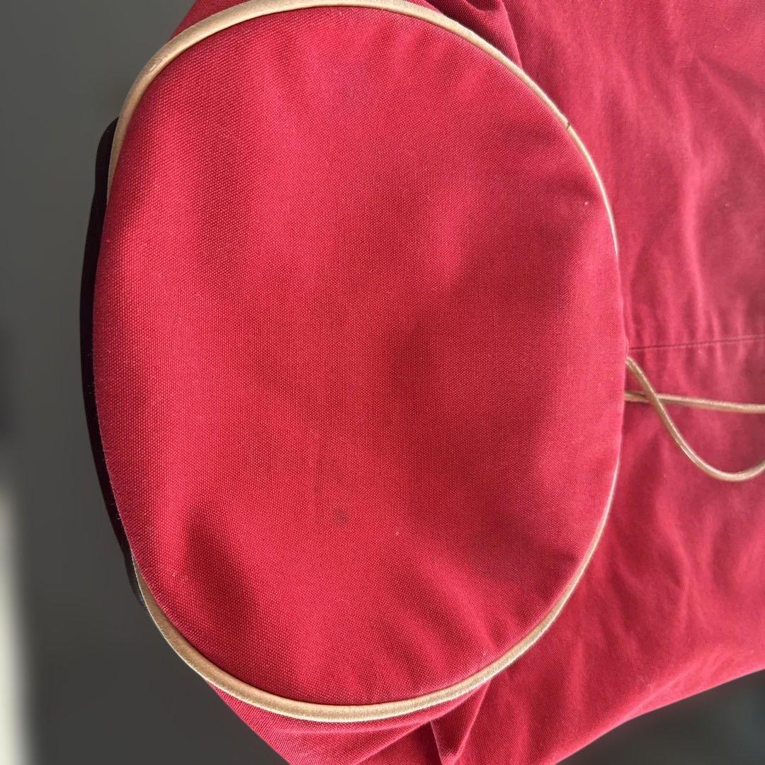 エルメス赤いキャンバスドローストリングショルダーバック