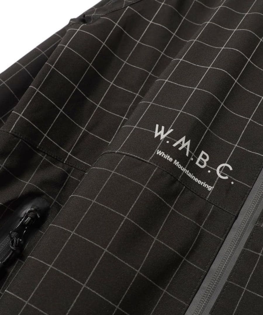 ホワイトマウンテニアリング WM × キウ KiU ロングジャケット - メルカリ