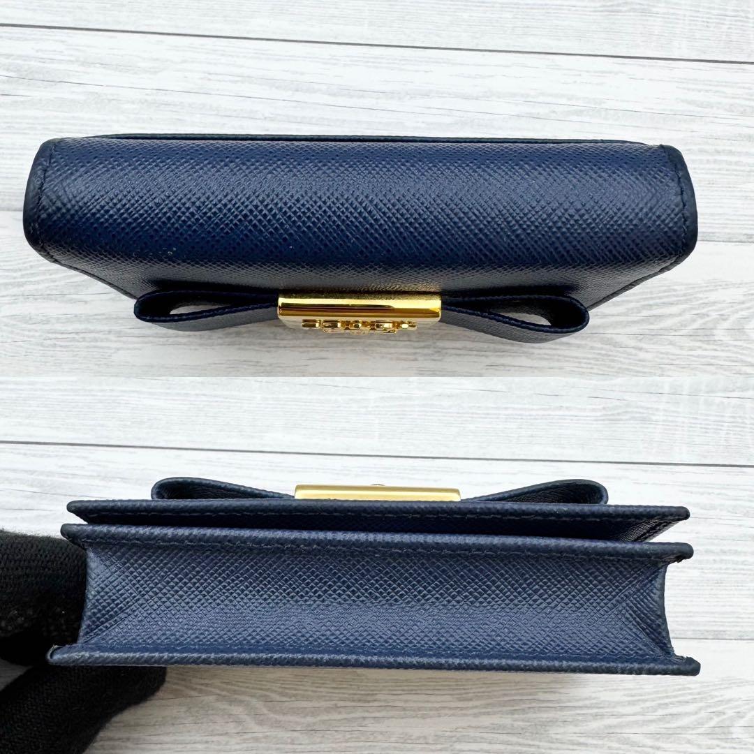 美品】PRADA サフィアーノレザー 名刺入れ リボン ネイビー - メルカリ