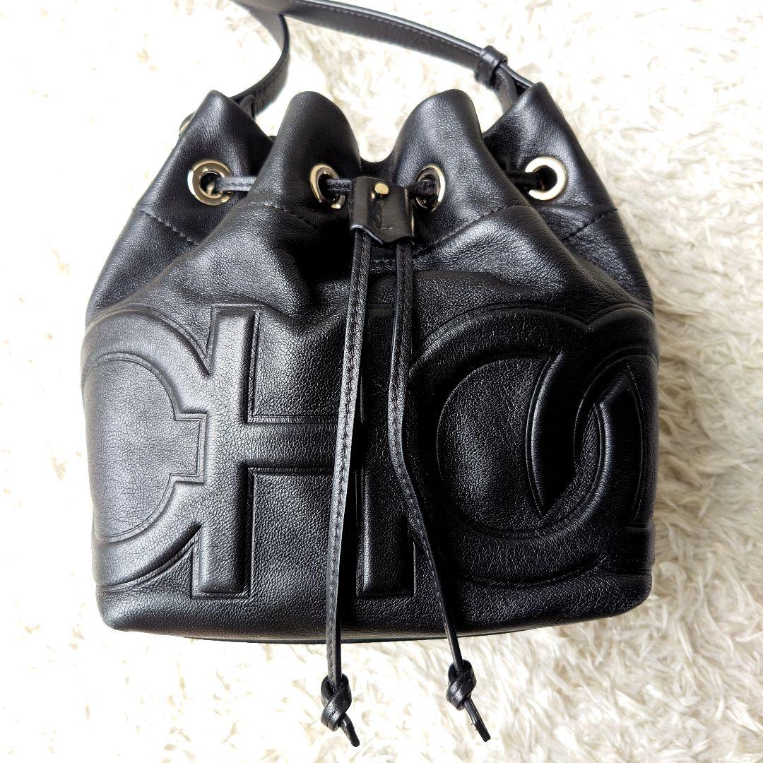 Jimmy Choo ジュノ 巾着 ブラック 型押しロゴ デカロゴ - メルカリ