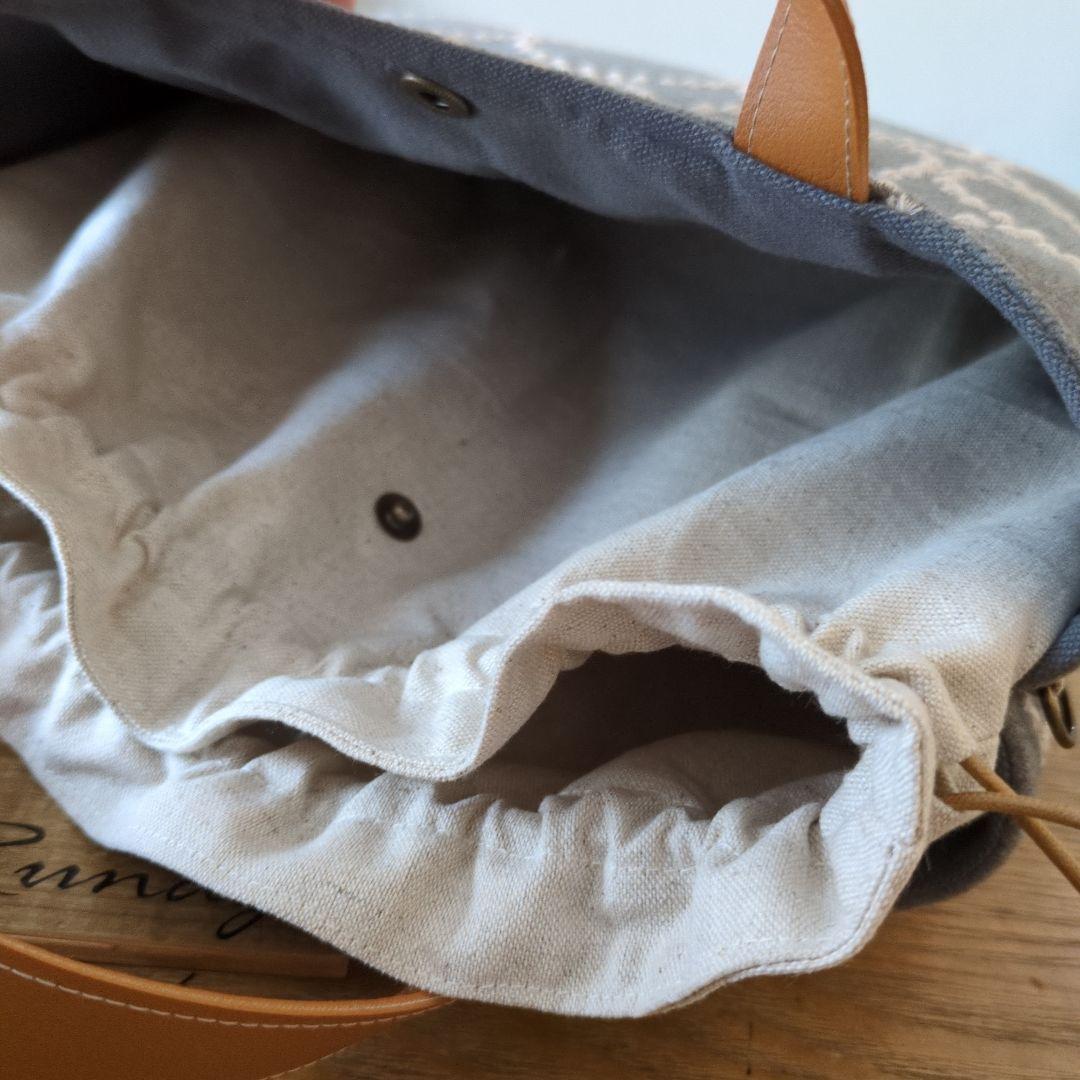 1572】あおりポケットの巾着バッグ＊ミナペルホネン