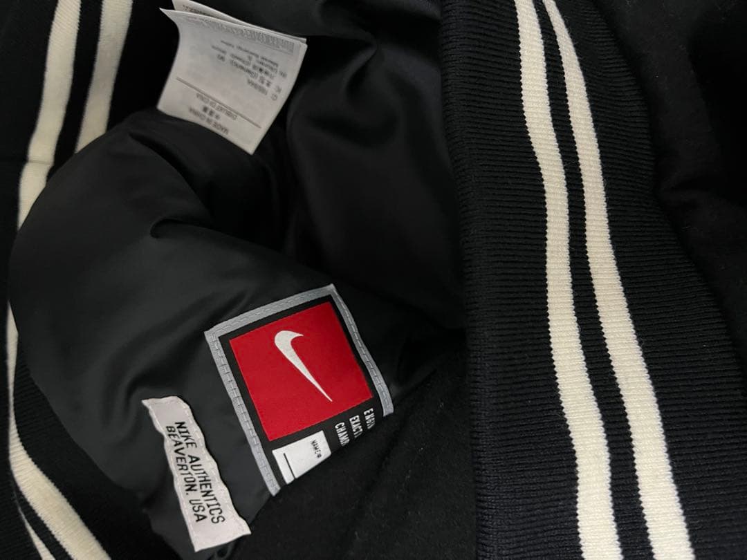 ナイキ NIKE VARSITY JKT スタジャンレザーS新品 - メルカリ