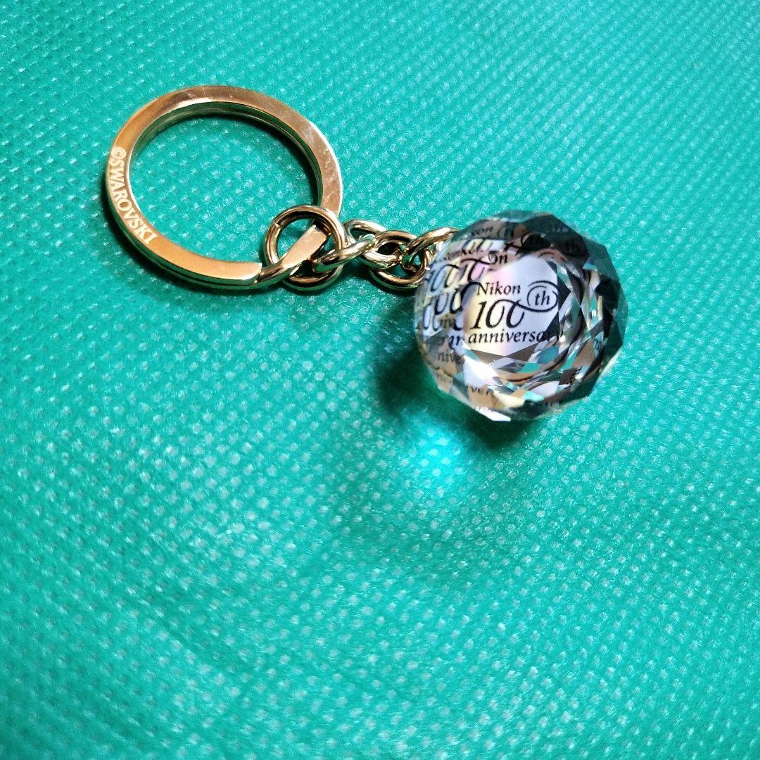 Nikon 100周年記念品 SWAROVSKI キーホルダー - メルカリ