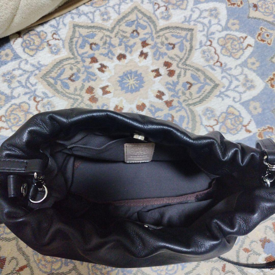 ラシット レザー巾着4WAYショルダーバッグ russet ブラック - メルカリ